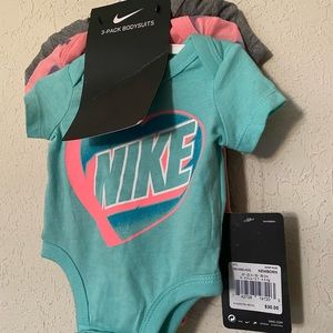 Nike 3 pack bodysuits Girls newborn size NWT